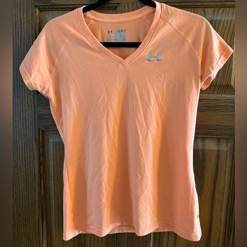 Orange Under Armour athletic short sleeve shirt